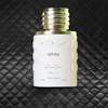 Perfume bottle labeled 'White' on a white textured background